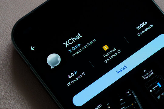 XChat app listing by X Corp displayed in Google Play Store on a smartphone screen with install button and download details. Stafford, United Kingdom, August 2, 2026.