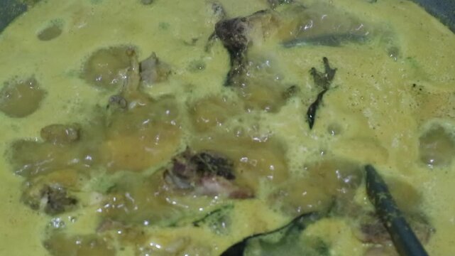 Traditional homemade chicken curry cooked in a creamy coconut milk sauce.