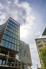 Fototapeta premium Modern city innovation in Brussels, Belgium showcasing contemporary European office architecture with elegant glass surfaces, clean geometric lines, dynamic urban design and attractive city