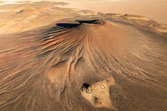 Aerial view of volcanic cinder cone in Puna, Argentina
