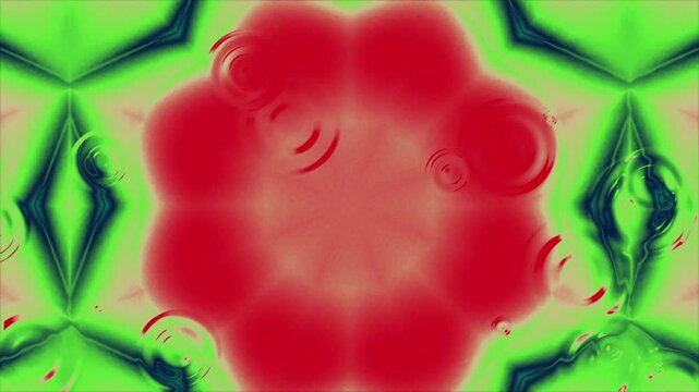 Abstract digital art background with vibrant red and green kaleidoscopic geometric patterns.