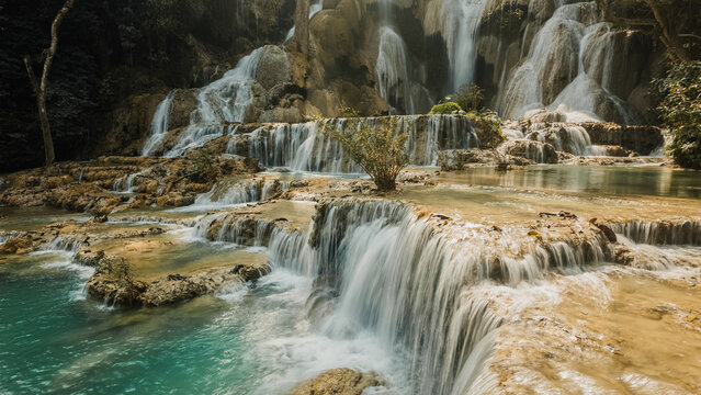 Kuang Si Waterfall cascades through limestone terraces in Laos