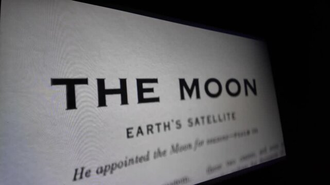 Macro view of printed text about moon geography on paper a close up view