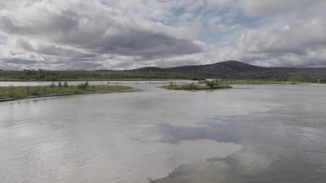a panning view of the junction of the chena and tenana rivers near fairbanks, alaska of the united states
