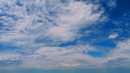Fototapeta premium Beautiful summer sky with floating clouds, panorama, banner