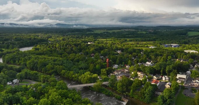 Shawangunk, NY, USA - July 29, 2026. Aerial video of the Hamlet of Wallkill in the Town of Shawangunk NY, Ulster County, on a partly cloudy summer afternoon.	