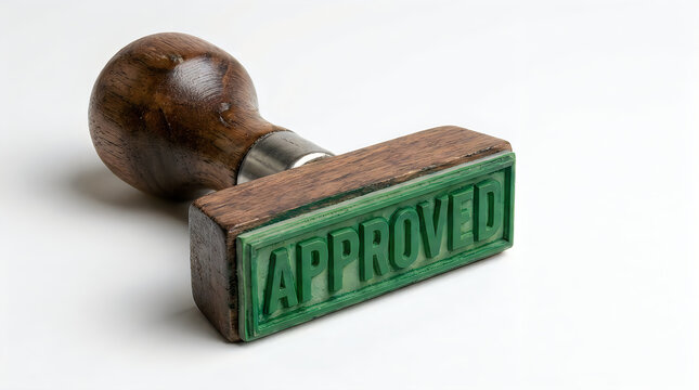 Vintage wooden rubber stamp with green approved text on white background stamp pad approved business
