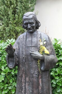 Ars sur Formans, France - February 17, 2017: Statue of the Cur&eacute; d'Ars Jean-Marie Vianney in Ars-sur-Formans, France