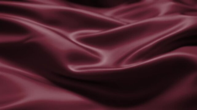 Luxury burgundy silk fabric animation with smooth flowing folds and glossy satin texture. Seamless looping abstract background video for premium branding, fashion, presentations and elegant motion gra