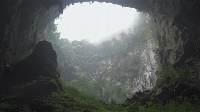 second doline in Son Doong the world biggest cave with small person scale model