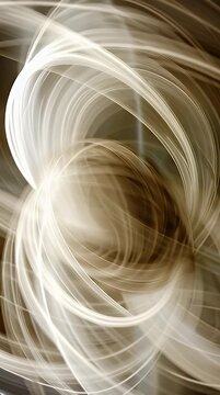 Abstract light trails swirl in a dynamic spiral pattern against a dark background creating an ethereal and modern design element perfect for backgrounds or overlays