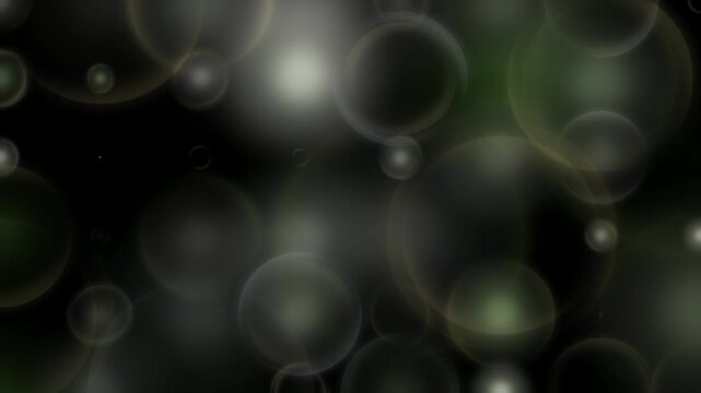 Soft olive green and golden bokeh overlapping circles on a black background. Abstract defocused lens flares and translucent floating orbs creating a cinematic, moody atmosphere.