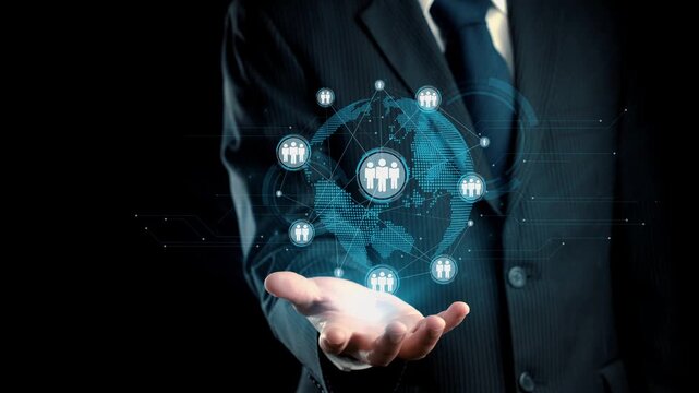 A businessman showcases a virtual network of people connections above his outstretched hand, symbolizing modern business communication and global collaboration. Qubit
