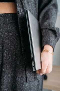 Computer job. Digital business. Unrecognizable female professional expert with laptop preparing for modern career routine.