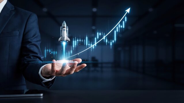 Businessman holding a rocket launching with growth chart