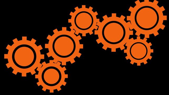 Bright orange mechanical gears connected together forming a creative industrial pattern on a solid black background representing teamwork and engineering processes in modern business