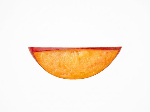 A single juicy slice of fresh red plum showing the bright orange textured flesh inside