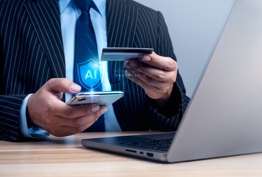 Businessman using credit card and smartphone with AI security interface. AI authentication, payment verification, fraud prevention, secure online banking, digital identity, and fintech cybersecurity.