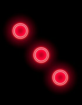 Glowing red light orbs floating in dark space.