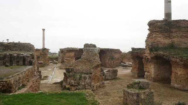 Panorama: ancient ruins of Carthage archaeological site overlooking Mediterranean Sea in Tunis Governorate Tunisia under overcast sky