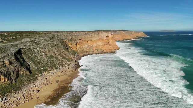 Ethel Beach, Dhilba Guuranda-Innes National Park, South Australia &ndash; 4K aerial drone view of sandy beach, dramatic limestone cliffs, turquoise ocean and rugged Yorke Peninsula coastline