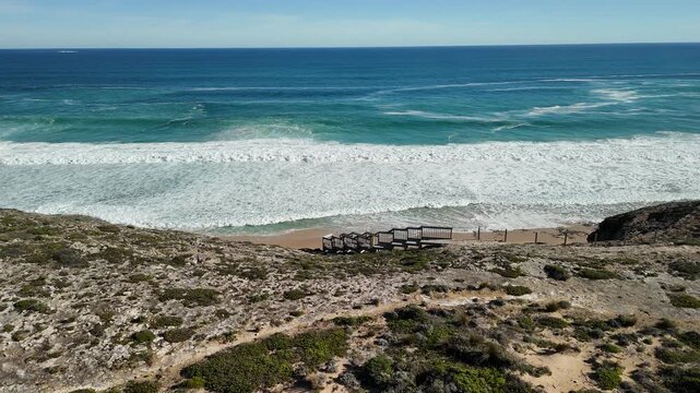 Ethel Beach, Dhilba Guuranda-Innes National Park, South Australia &ndash; 4K aerial drone view of sandy beach, dramatic limestone cliffs, turquoise ocean and rugged Yorke Peninsula coastline