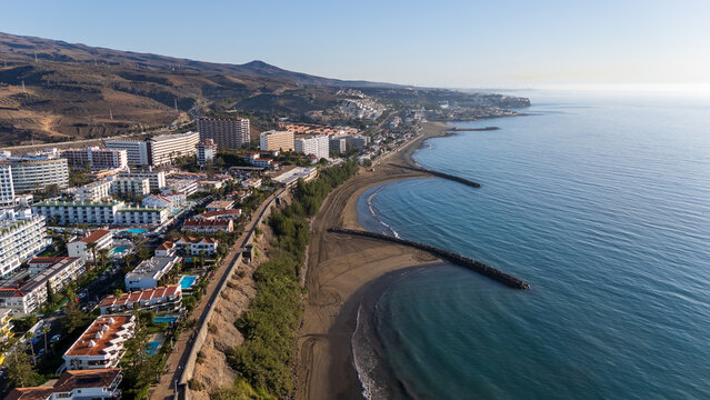 Aerial panorama view of hotels in Playa del Ingles, beach, hills and Atlantic ocean on Canary Island Gran Canaria, Spain