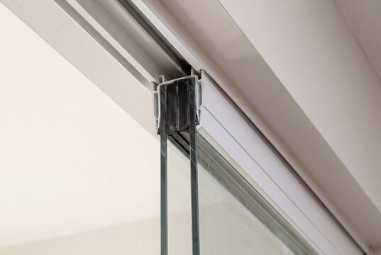 Close up of double pane sliding glass door track