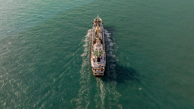 Aerial view oil tanker ship on sea, Oil tanker ship global business logistic and maritime transportation of petroleum petrochemical supply chain, Oil tanker ship  sailing on the sea.