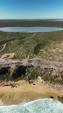 Ethel Beach, Dhilba Guuranda-Innes National Park, South Australia &ndash; 4K aerial drone footage of sandy beach, dramatic limestone cliffs, turquoise ocean and rugged Yorke Peninsula coastline