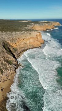 Ethel Beach, Dhilba Guuranda-Innes National Park, South Australia &ndash; 4K aerial drone footage of sandy beach, dramatic limestone cliffs, turquoise ocean and rugged Yorke Peninsula coastline