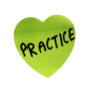 Green heart shape with the word practice written in black marker