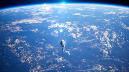 Wide Shot of Astronauts Performing Spacewalk in Deep Space in Zero Gravity Above Planet Earth Horizon. © SohubProduction
