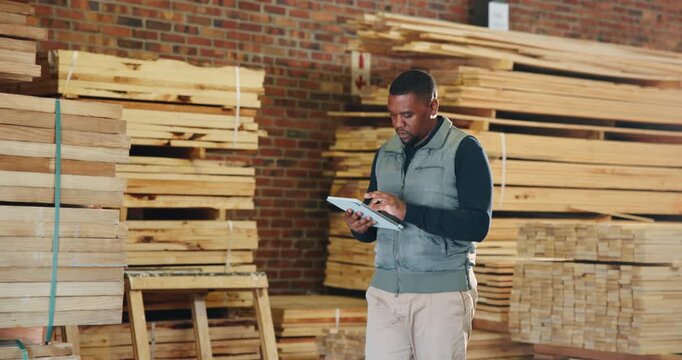 Carpenter, inspection and black man on tablet for inventory, quality assurance and checklist. Workshop, carpentry and person on tech for woodworking, timber production and evaluation report for wood