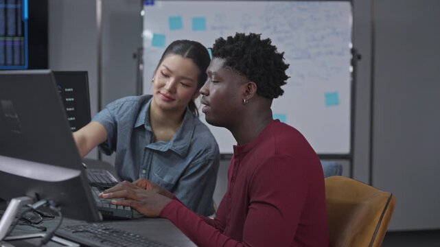 Female and male developers engage in peer discussion exploring AI research concepts and development innovation through collaborative exploration and experimentation.