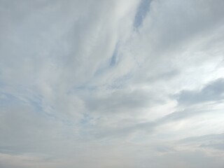 Fototapeta premium Soft white clouds in a bright blue sky