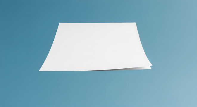 A white trapezoidal sheet suspended against a blue sky background