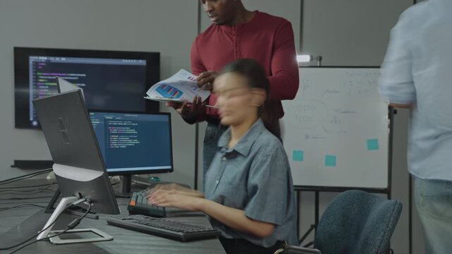 Timelapse video of development team rushing through fast-paced sprint coding under deadline pressure, showing busy workflow and rapid execution intensity.
