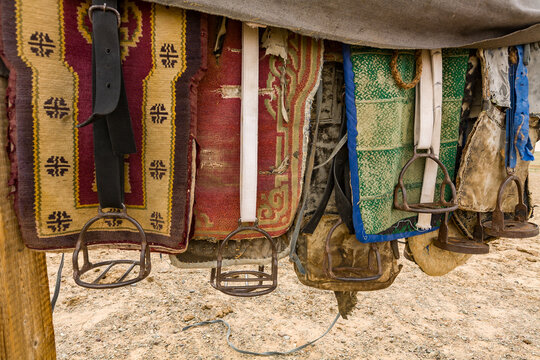 Colorful Mongolian saddles close up
