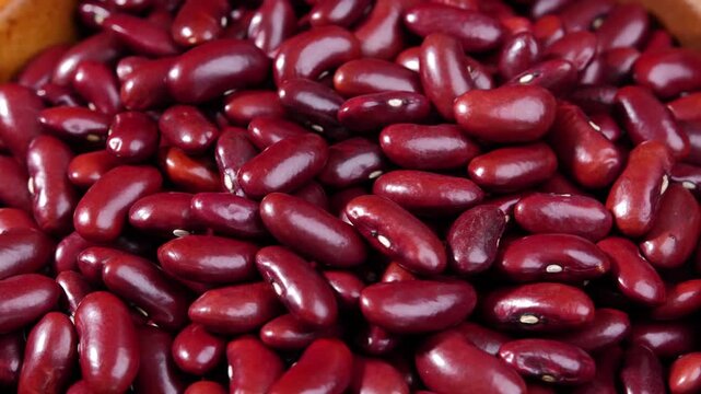 Dried red beans in a wooden bowl