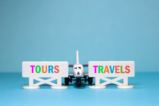 Airplane with tours and travels road signs