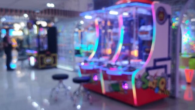Blurred Defocused Arcade Game Center with Colorful Neon Lights and Claw Machines Background, Bokeh Entertainment Backdrop