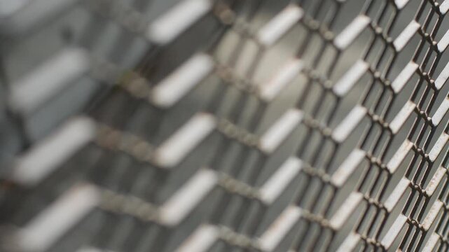 Rusty Chain Link Fence Mesh in Diagonal Perspective with Sunlight