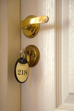 Lock with key from hotel room 218