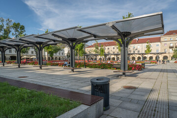 Old Market Square in Łódź with Modern Architecture and Blooming Flower Beds on a Sunny Day © Senatorek