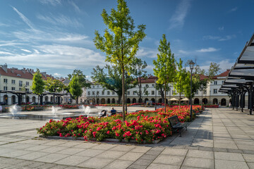 Old Market Square in Łódź with Modern Architecture and Blooming Flower Beds on a Sunny Day © Senatorek