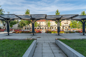 Old Market Square in Łódź with Modern Architecture and Blooming Flower Beds on a Sunny Day © Senatorek