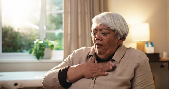 Cough, sick and old woman in doctor office with virus, medical emergency and asthma attack symptoms. Elderly person, health crisis and respiratory infection in clinic with illness, problem or disease