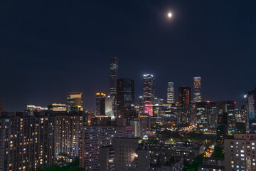 Fototapeta premium The skyline of Beijing's CBD under the moonlight