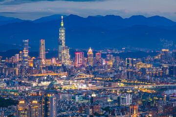 Fototapeta premium Taipei 101 and city skyline illuminated at blue hour